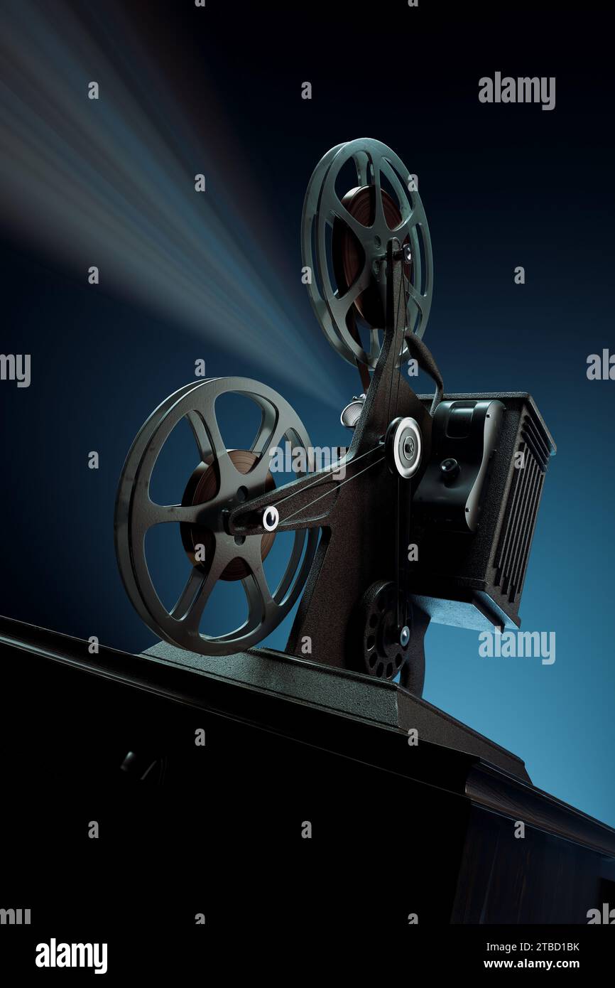 Projecteur de film vintage nostalgique coulant des rayons de lumière illuminés dans l'obscurité Banque D'Images
