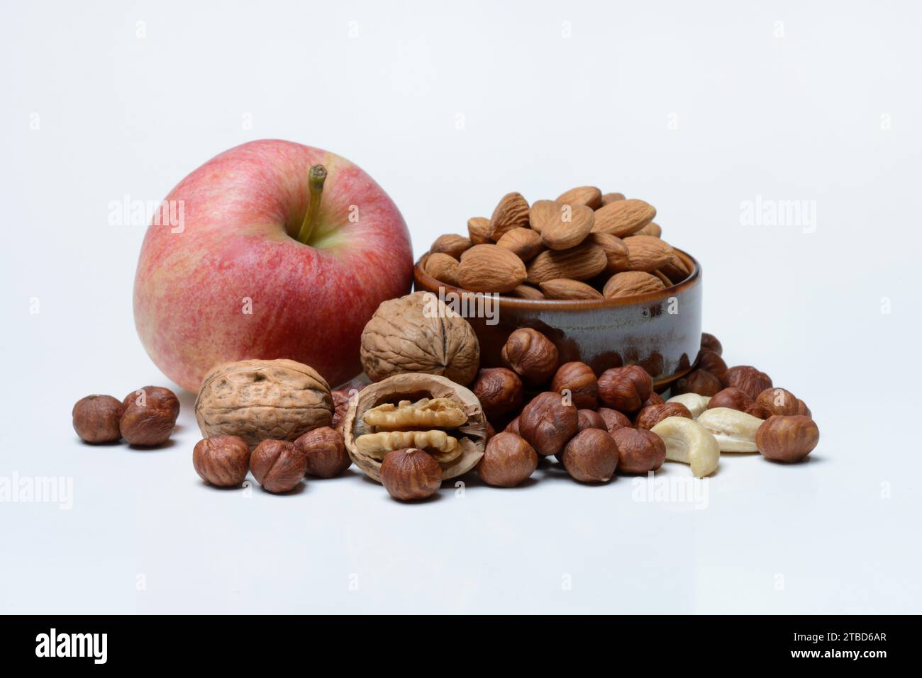 Diverses noix et pomme Banque D'Images