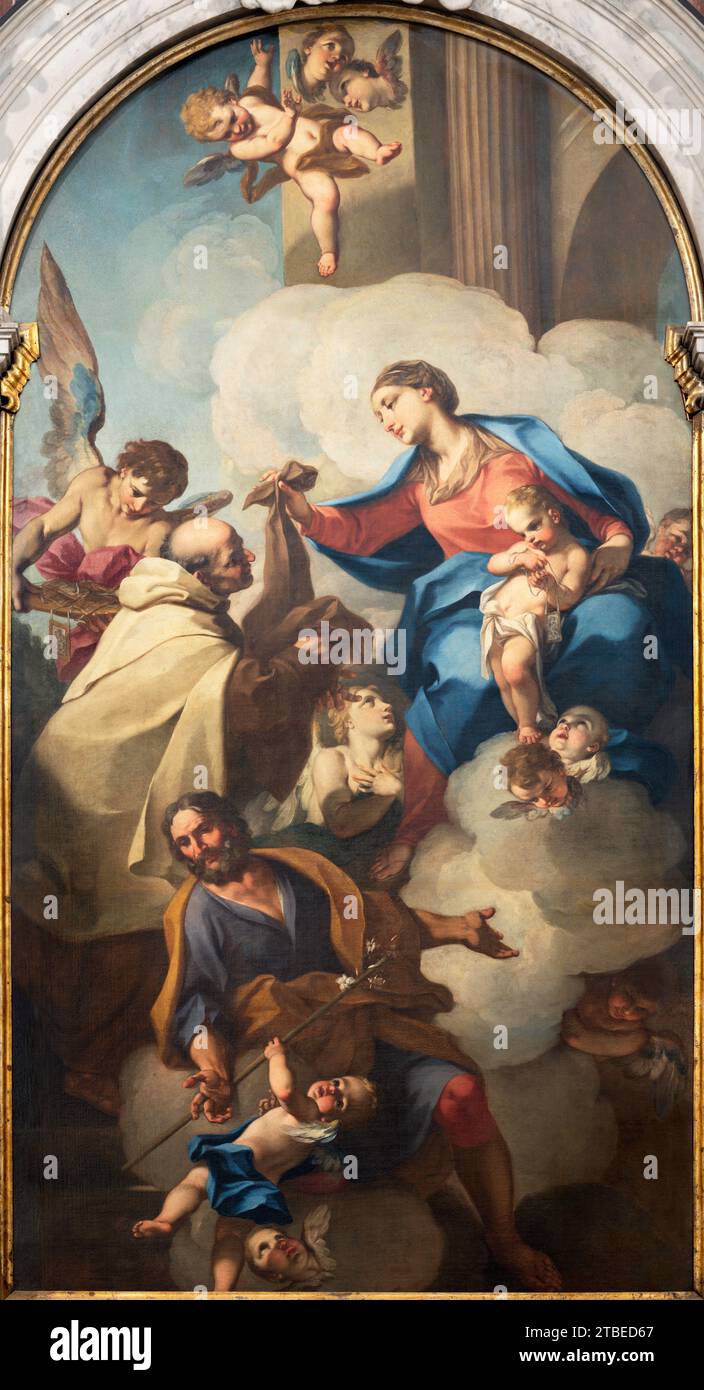 VICENCE, ITALIE - 7 NOVEMBRE 2023 : la peinture de Madone de Scapulaire avec la Sainte Simon stock et St. Jospeh dans l'église Chiesa di San Marco Banque D'Images