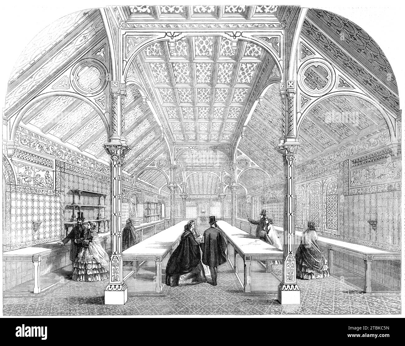 The Royal Dairy à Frogmore, près de Windsor, 1861. « La nouvelle laiterie royale... tout juste terminée, est un joyau parfait du goût et de l'art. la longueur est divisée en un centre et deux côtés, formés par des colonnes octogonales de taille, ayant des chapiteaux très enrichis, harmonieusement colorés ; les arbres sont également délicatement sculptés. Entre ces piliers et autour des côtés des murs, sont disposées des tables de marbre blanc... en dessous d'eux sont des réservoirs... qui sont alimentés par un courant clair d'eau froide... il y a dix fenêtres de vitraux richement teintés, composées de fleurs de mai, primevres, marguerites et buttercups Banque D'Images