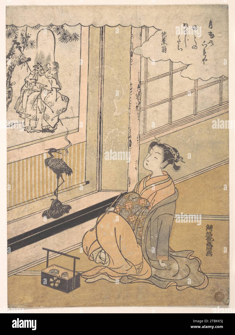 Une jeune femme assise dans une salle et regardant un Kakemono de Fukurokujin 1918 par Isoda Koryusai Banque D'Images