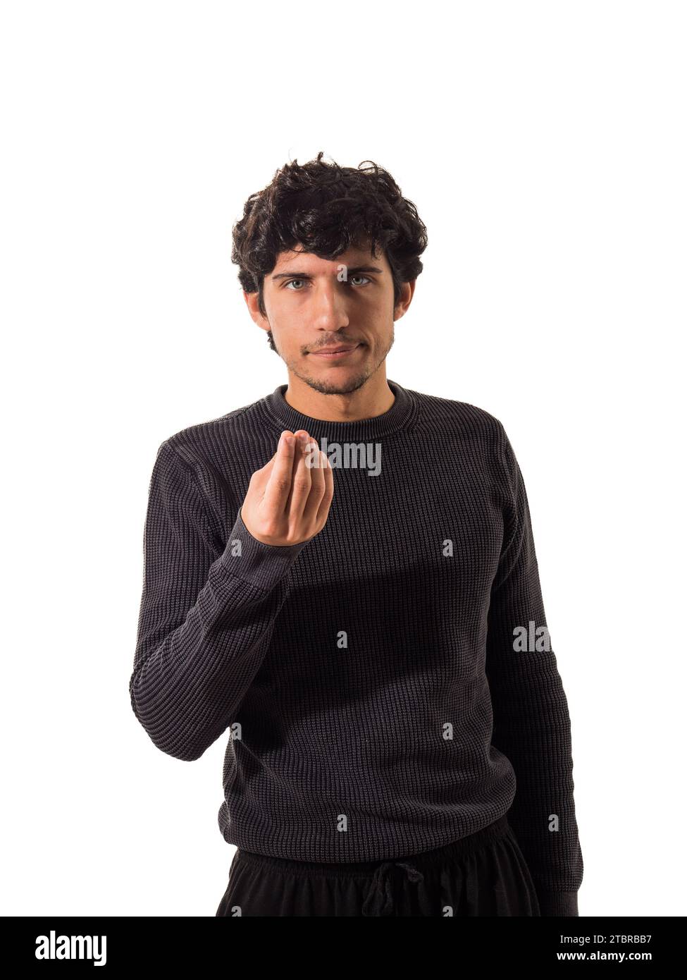 Un homme debout devant un fond blanc faisant un geste italien pour une question ou un doute, isolé sur fond blanc en studio Banque D'Images