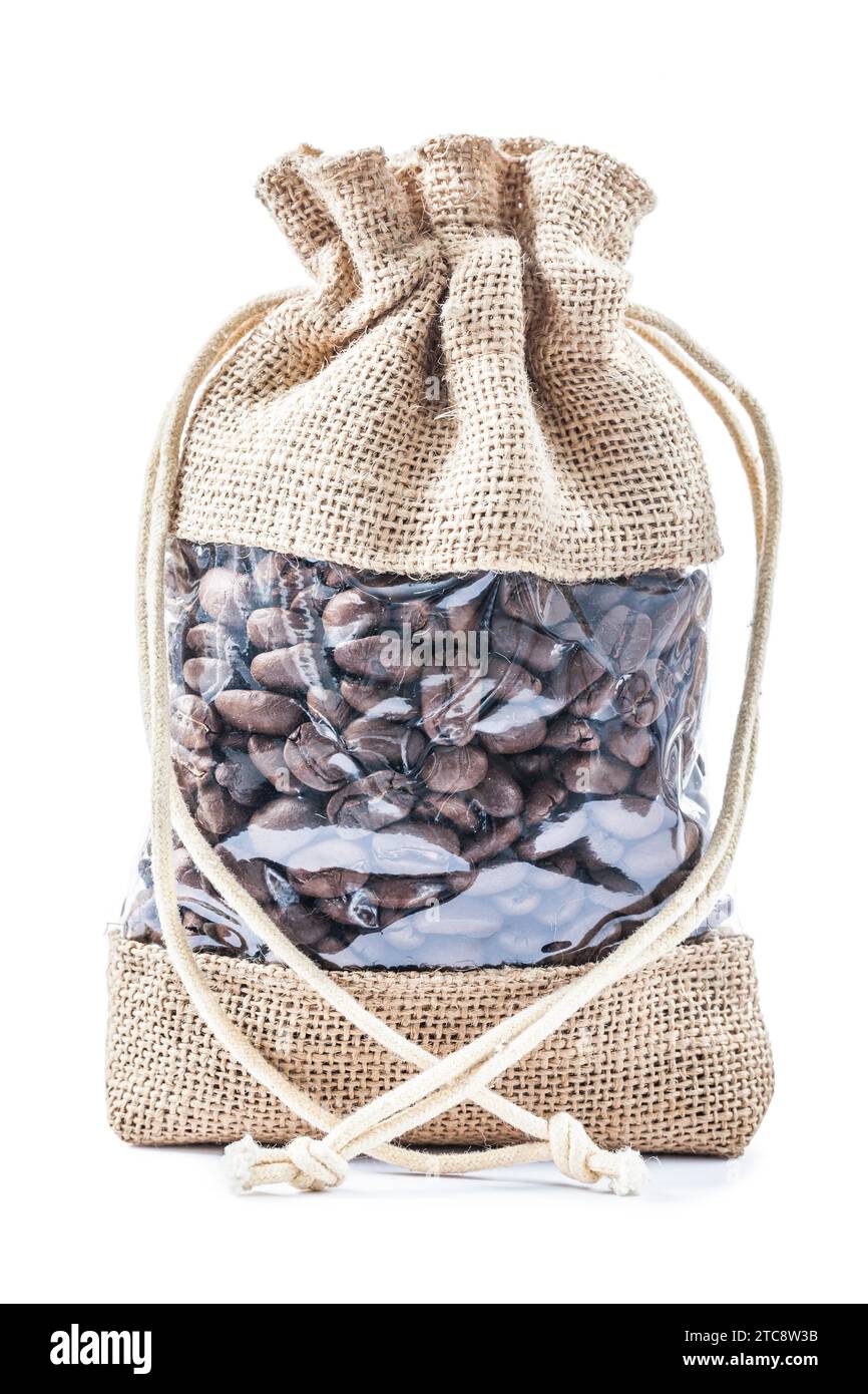 Sac en toile de jute isolé avec des grains de café Banque D'Images