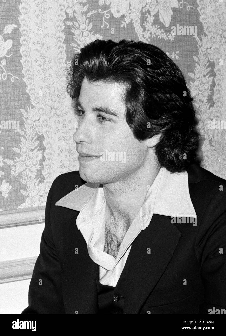 John Travolta lors d'une conférence de presse pour 'Saturday Night Fever', 1977. (Référence de fichier 34580-490TH) Banque D'Images