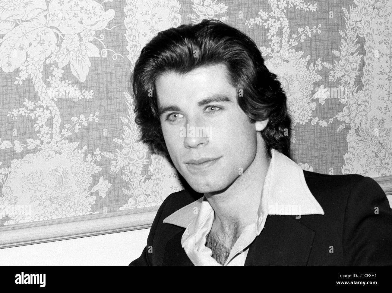 John Travolta lors d'une conférence de presse pour 'Saturday Night Fever', 1977. (Référence de fichier 34580-504TH) Banque D'Images