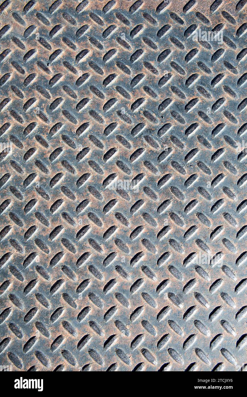 Vieux motif de texture de plaque de métal de diamant rouillé utilisé comme fond abstrait Banque D'Images