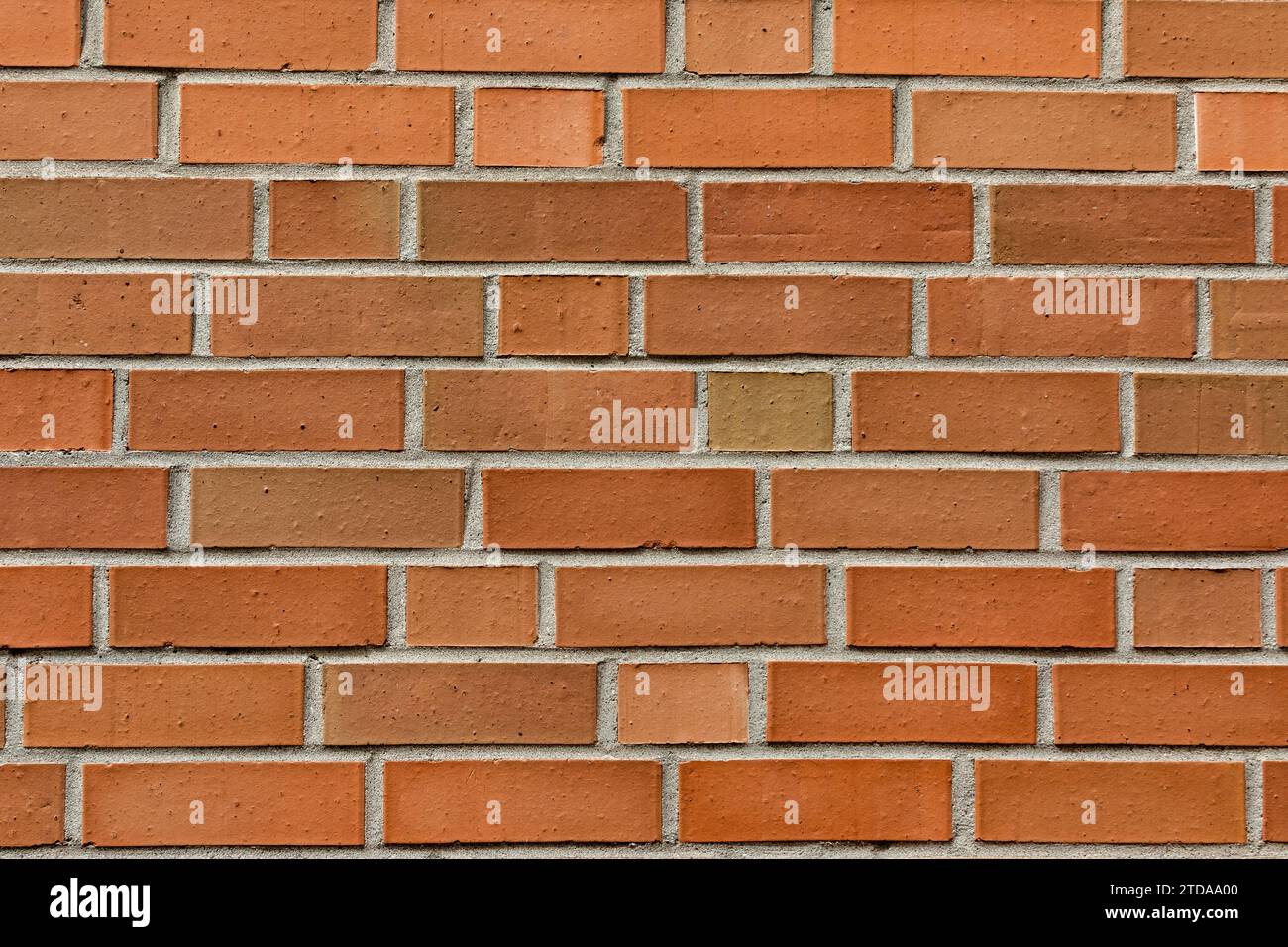 Texture de fond de mur de brique d'argile rouge : conception vintage et texturée pour des projets d'architecture et de photographie Banque D'Images