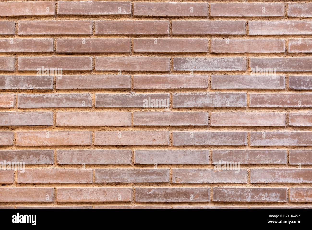 Texture de fond de mur de brique espagnole : surface polyvalente et intemporelle pour diaporamas et présentations Banque D'Images