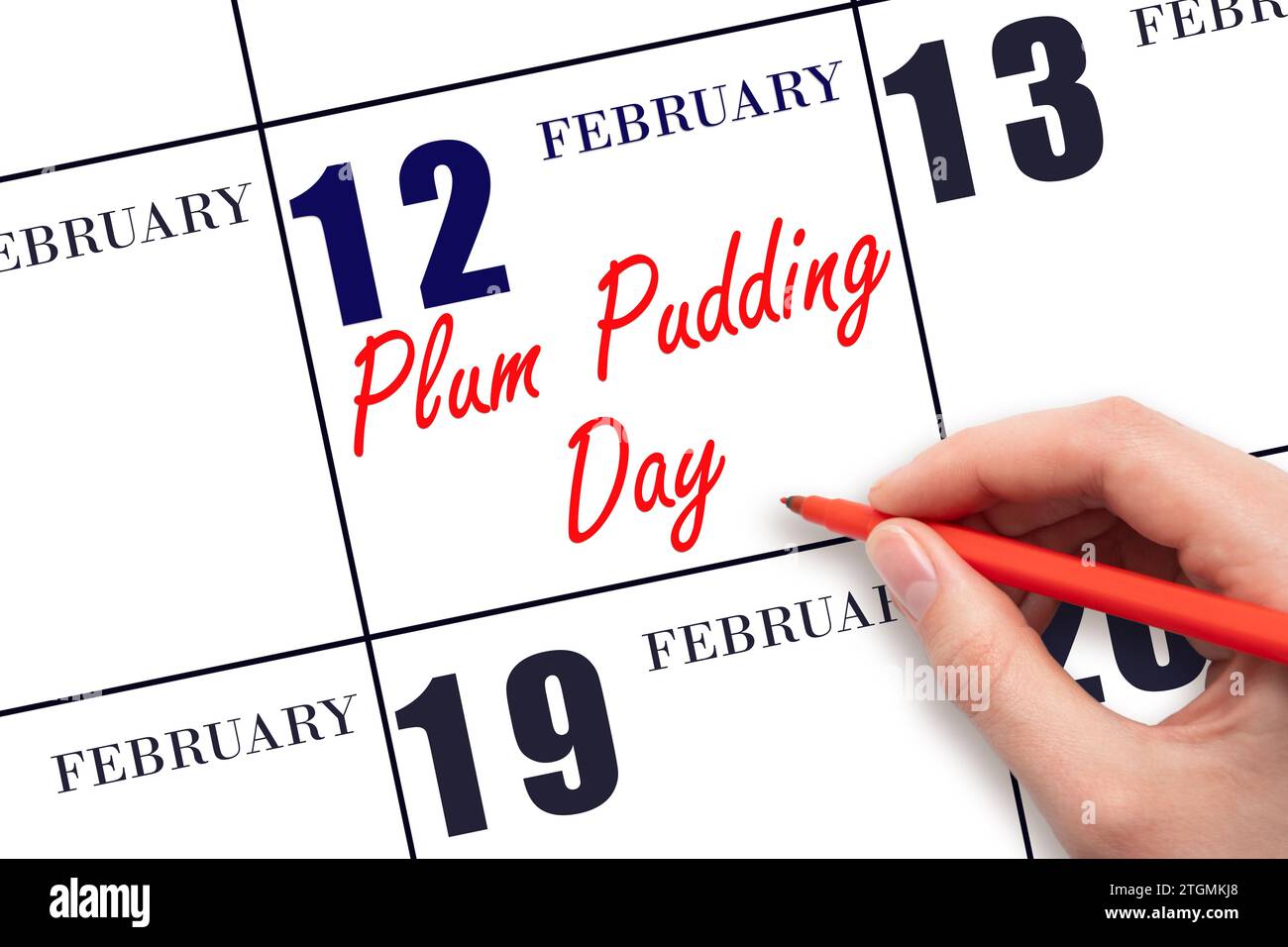 Février 12. Texte d'écriture à la main Plum Pudding Day à la date calendaire. Enregistrez la date. Vacances. Concept du jour de l'année. Banque D'Images