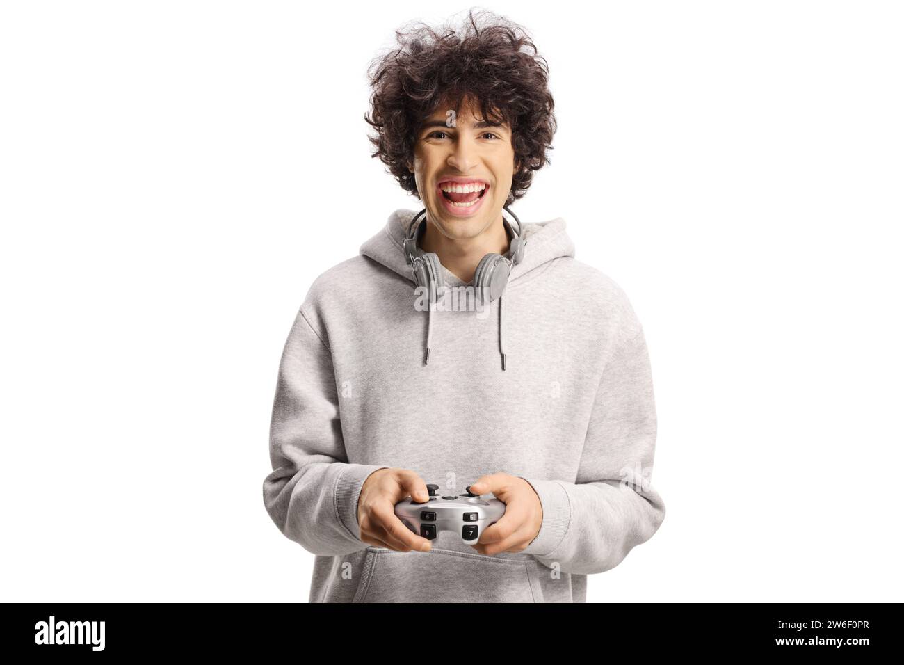 Mec excité jouant à un jeu vidéo avec joystick isolé sur fond blanc Banque D'Images