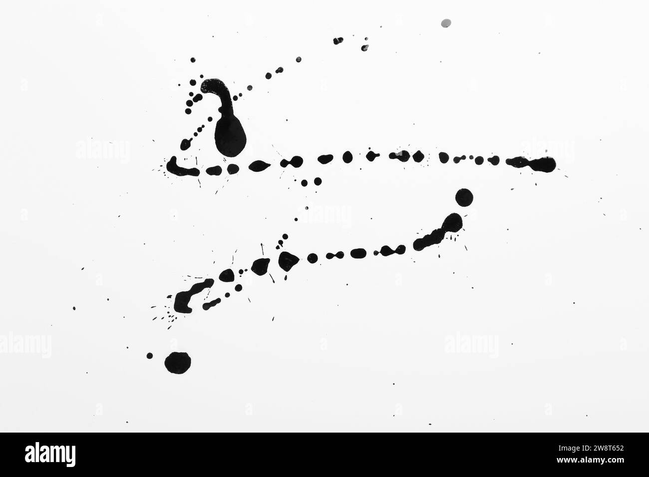 Taches d'encre noire sur fond blanc, vue de dessus Banque D'Images