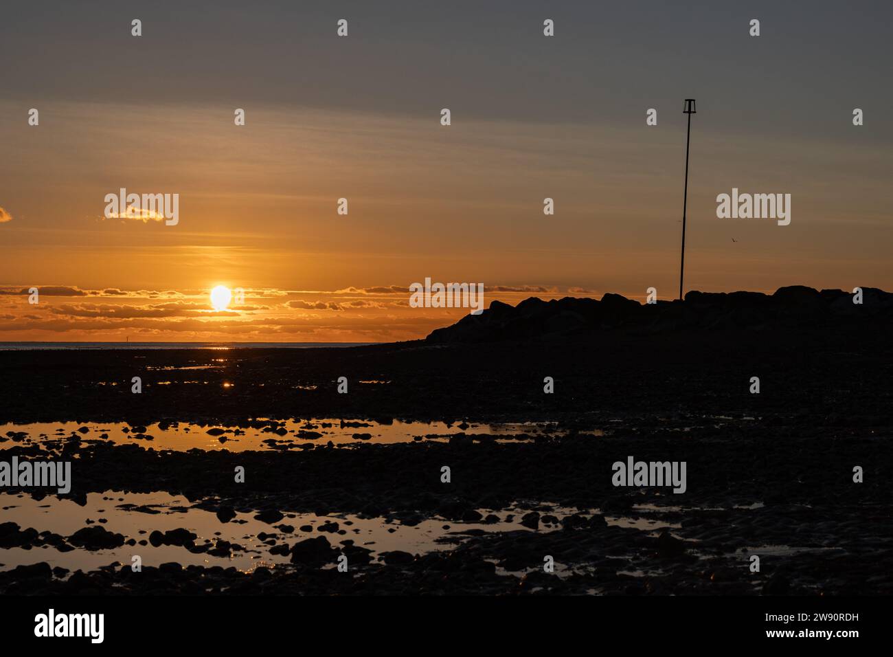 Coucher de soleil à Worthing Beach, West Sussex, Royaume-Uni Banque D'Images