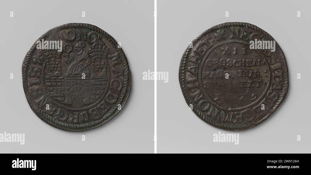 Douze Groschen, pièce de secours de Magdebourg, battue pendant le siège par les troupes impériales, Anonyme, pièce de 1629. SIEGE coin Front : Femme avec le cercle dans la main droite levée debout dans le château entre deux tours dans Kantschrift. Revers : inscription à l'intérieur Omnipia Virginburg argent (métal) frappant (travail des métaux) Virginburg Banque D'Images