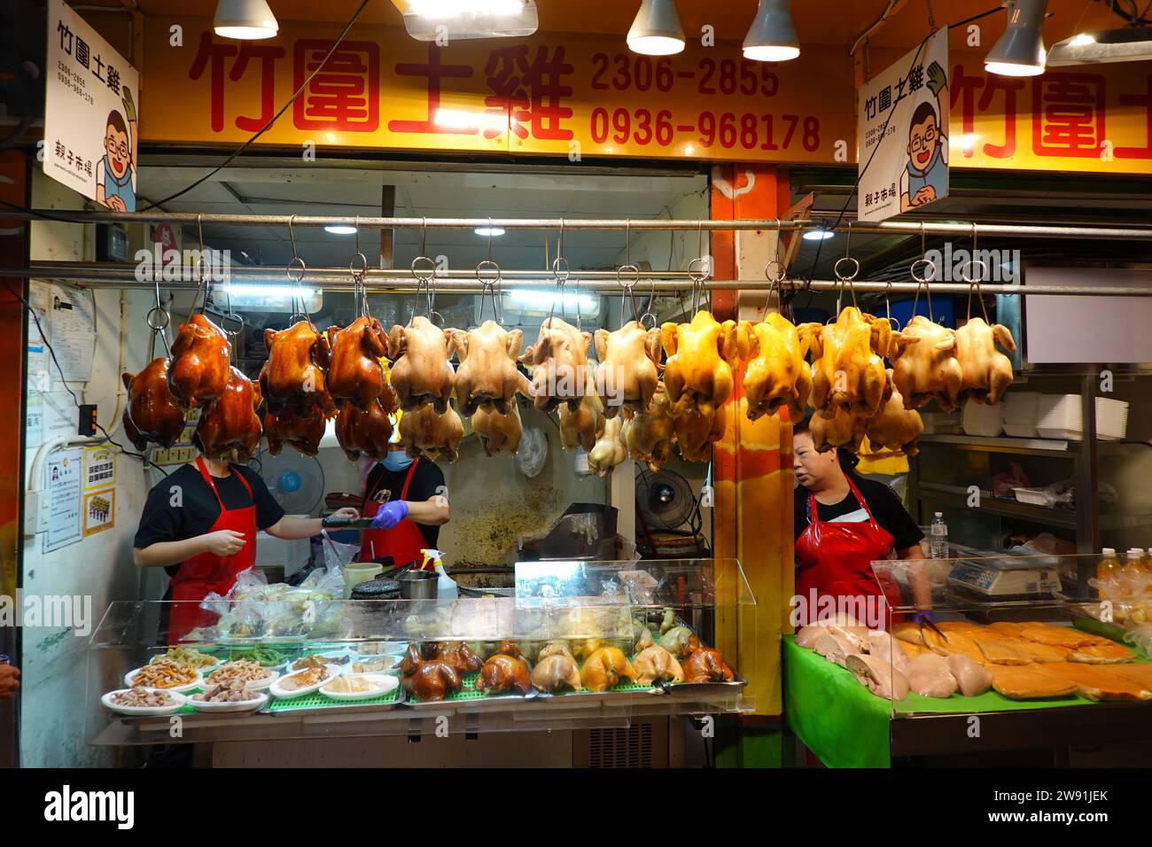 Vendeur de poulet, marché nocturne Huaxi, Taipei, Taiwan Banque D'Images