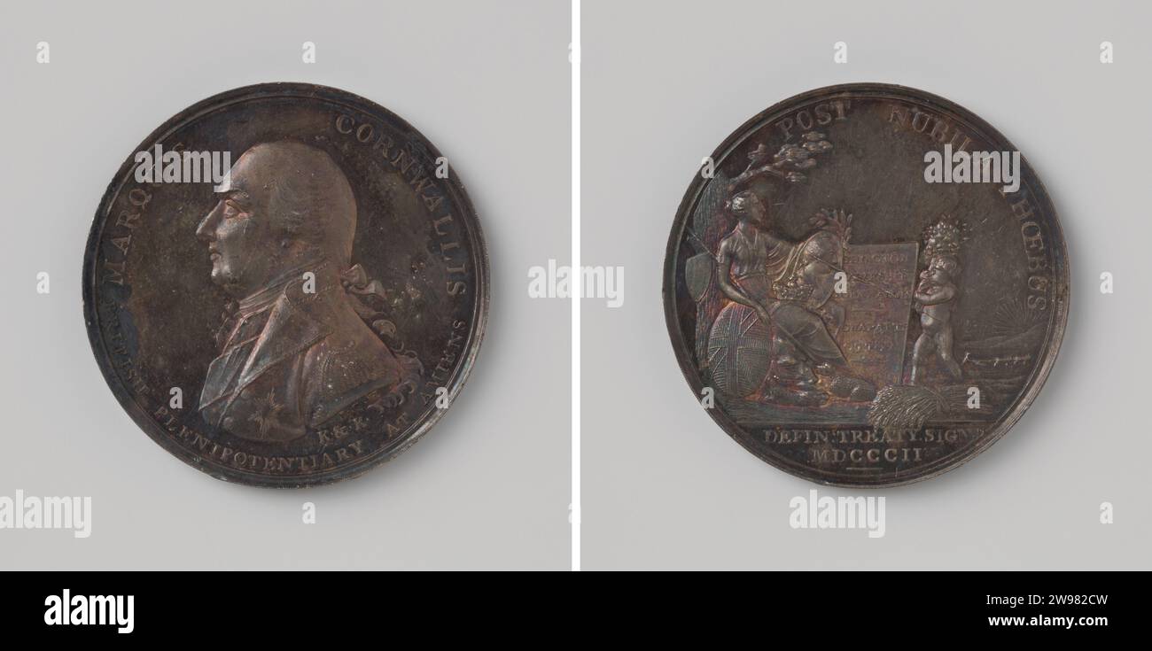 Paix d'Amiens, en l'honneur de Charles, comte de Cornwallis, négociateur pour l'Angleterre, Kempson & Kindon, médaille d'histoire 1802 Médaille d'argent. Devant : l'homme de poitrine à l'intérieur du changement. Revers : Brittania aux armoiries est sous un arbre, sur lequel pendent bouclier et épée ; la couronne et le médaillon de George III reposent sur ses genoux, au-dessus desquels elle tient une branche d'olivier ; à ses pieds se trouvent un lion et un agneau à côté d'une gerbe de maïs; pour elle un génie avec corne bourrée d'abondance, qui montre son assiette avec inscription à l'intérieur de la couverture ; Cut : inscription Birmingham argent (métal) frappant (travail du métal) Amiens Banque D'Images