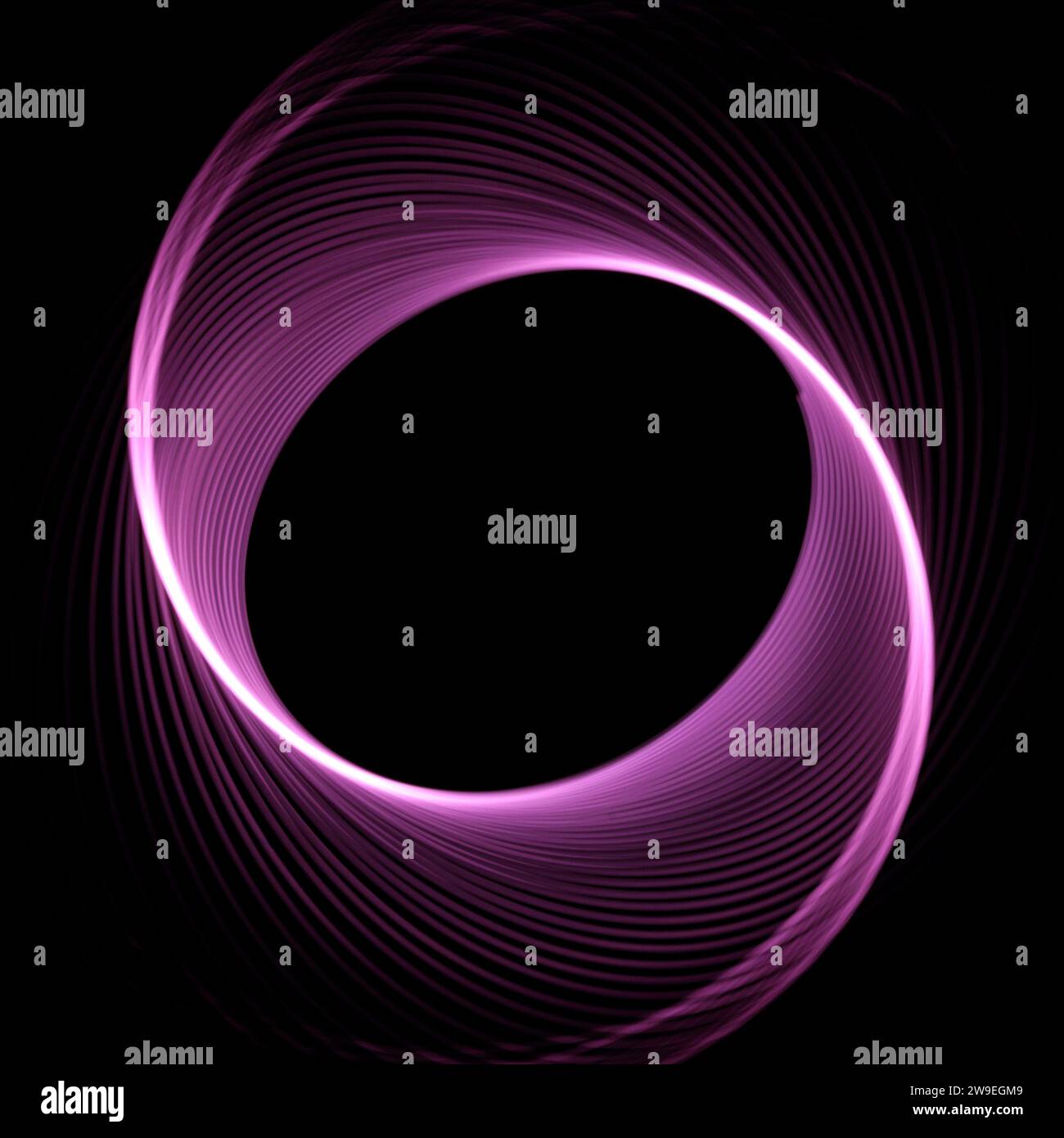 PHOTO : Photographie de peinture légère de spirographes blancs sur fond noir Banque D'Images