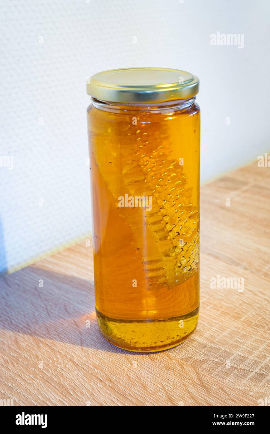 Pot de miel avec honeycomb Banque D'Images