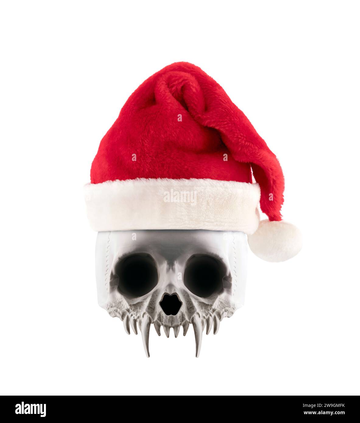 Crâne de vampire avec le chapeau rouge du Père Noël isolé sur fond blanc Banque D'Images