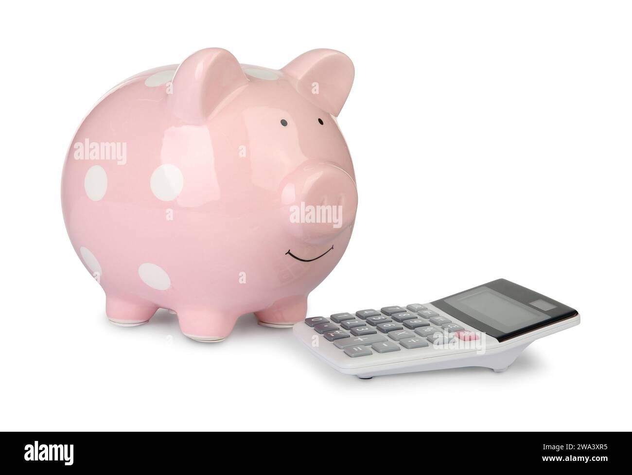 Tirelire et calculator isolated on white Banque D'Images