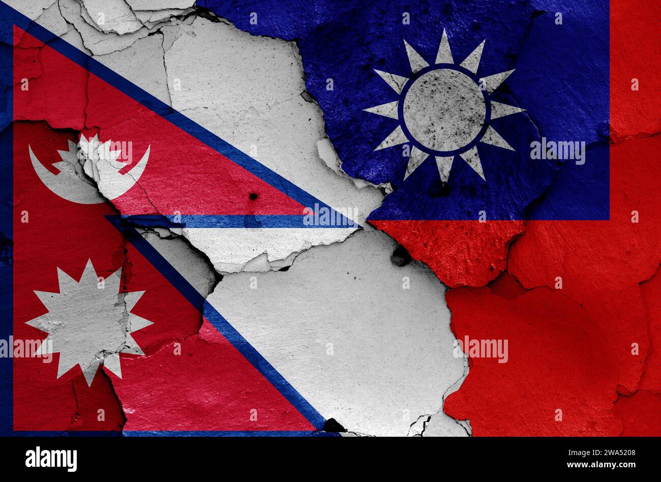 Drapeaux du Népal et de Taiwan peints sur un mur fissuré Banque D'Images