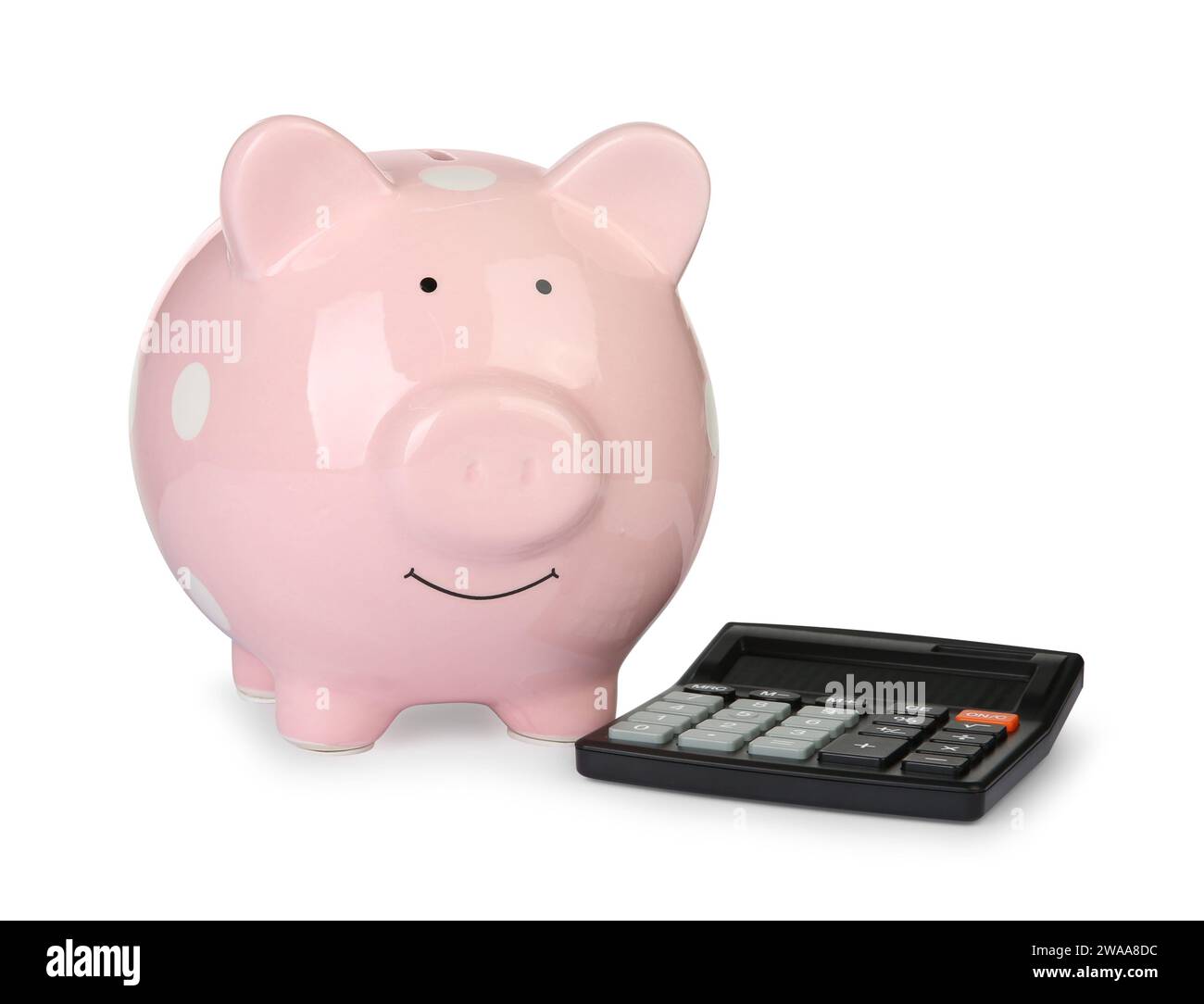 Tirelire et calculator isolated on white Banque D'Images