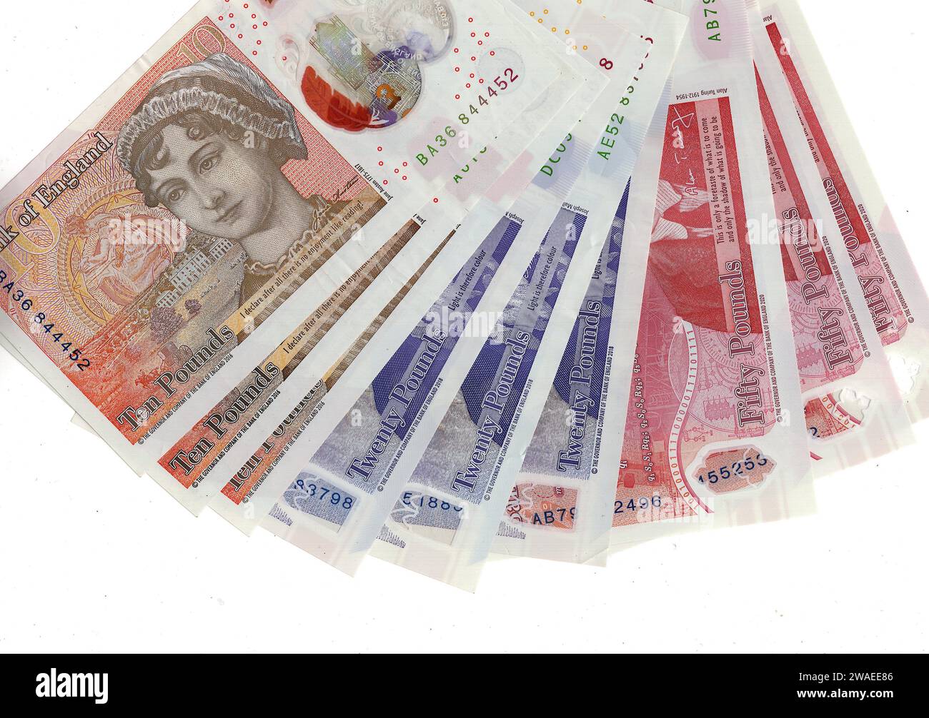 Un fan de billets de banque du Royaume-Uni/Grande-Bretagne isolé sur un fond blanc. Banque D'Images