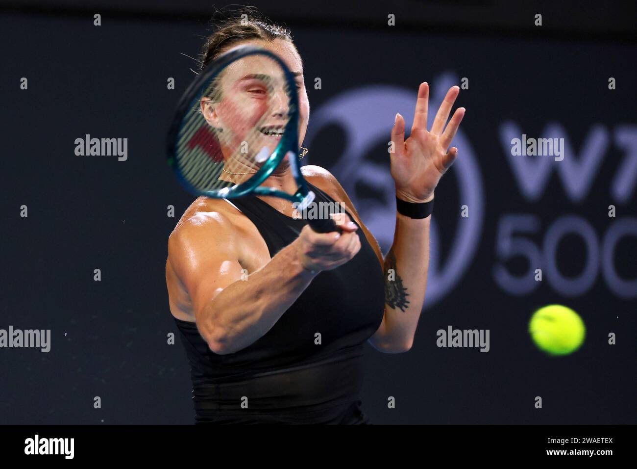 Aryna Sabalenka of Belarus plays a shot in her match against Lin Zhu of China during the Brisbane International tennis tournament in Brisbane, Australia, Thursday, Jan. 4, 2024. (AP Photo/Tertius Pickard) Banque D'Images
