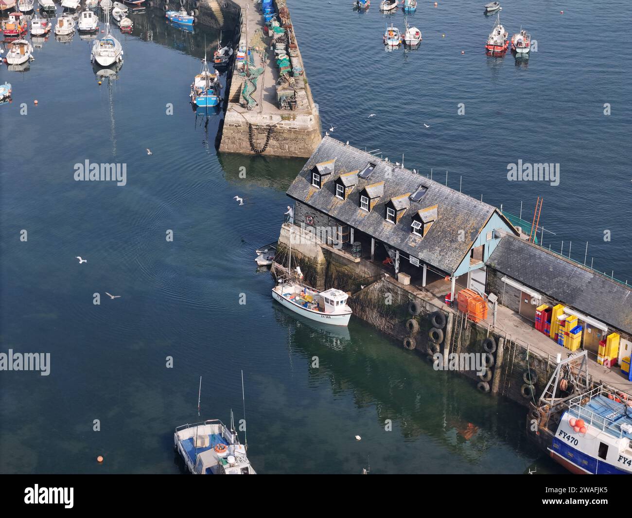 Village de pêcheurs de Mevagissey Cornwall côté port bâtiments drone, aérien Banque D'Images