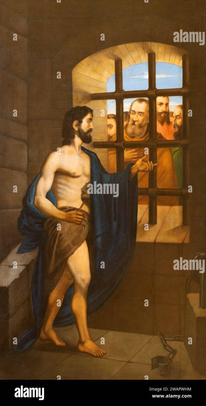 TRÉVISE, ITALIE - 4 NOVEMBRE 2023 : le tableau Saint Jean-Baptiste en visite en prison dans l'église Chiesa di San Gaetano par un artiste inconnu. Banque D'Images