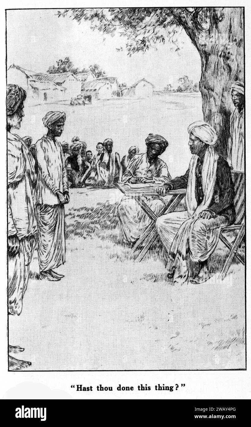 Gravure d'un jeune homme appelé devant une enquête de village en Inde, vers 1928. Banque D'Images