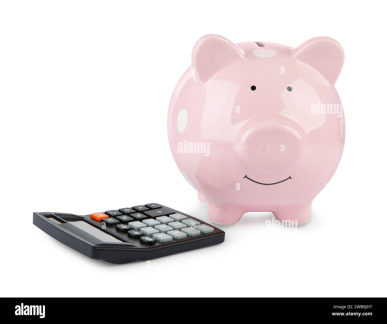Calculatrice et tirelire rose isolé sur blanc Banque D'Images