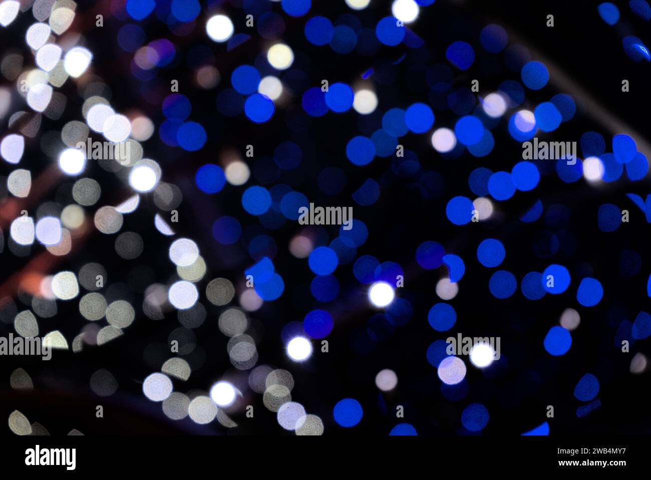 bulles de lumière bleue et blanche, fond abstrait, effet de flou bokeh Banque D'Images