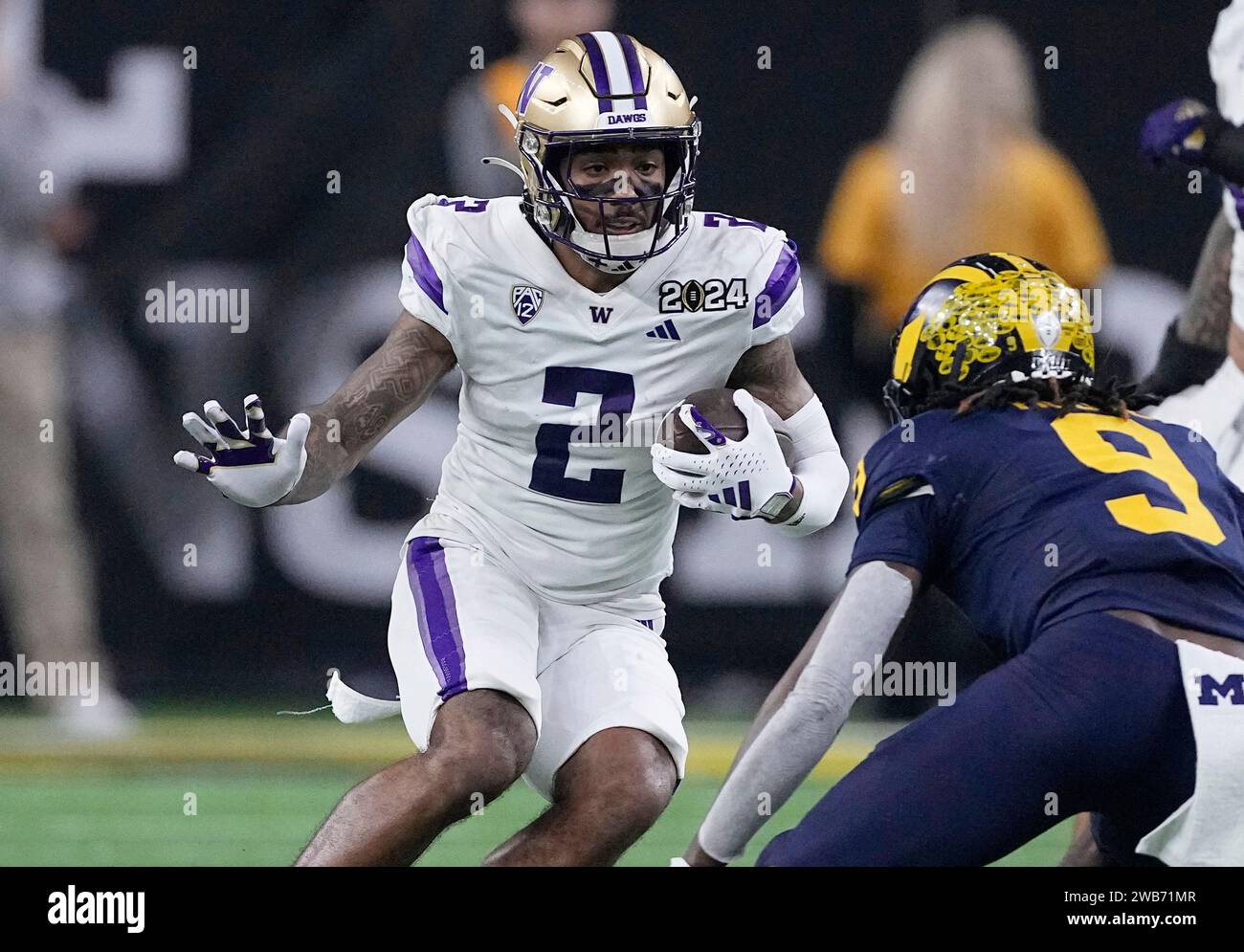 Houston, États-Unis. 08 janvier 2024. Le Wide Receiver des Huskies de Washington, Ja'Lynn Polk, se précipite après une courte passe contre les Wolverines du Michigan au troisième quart-temps lors du championnat national de football universitaire 2024 au NRG Stadium de Houston, Texas, le lundi 8 janvier 2024. Photo de Kevin M. Cox/UPI crédit : UPI/Alamy Live News Banque D'Images