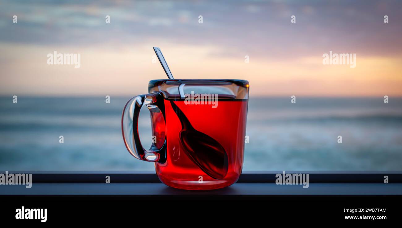 Mug en verre avec thé sur le rebord de la fenêtre sur fond de coucher de soleil du soir. Banque D'Images