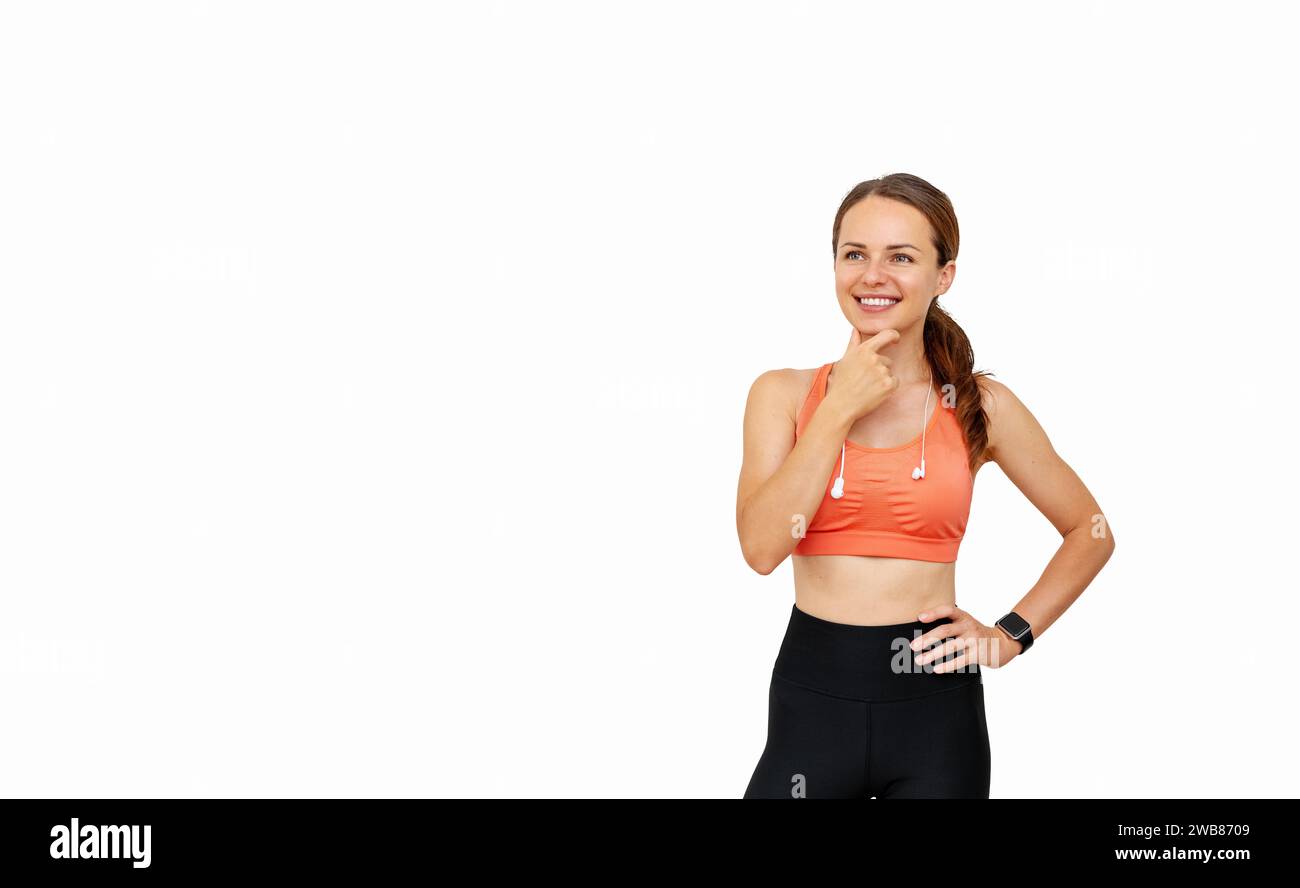 Maquette personne sportive féminine isolée portant des vêtements de sport choisissant un produit de sport, un exercice d'entraînement ou une nutrition sportive sur l'écran virtuel. Banque D'Images