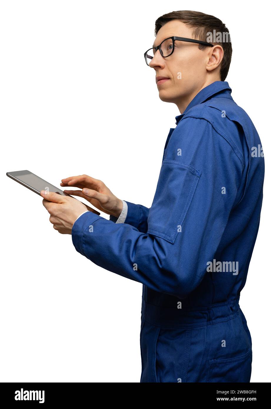 Homme avec une tablette numérique. Technicien, ouvrier, ingénieur. Banque D'Images