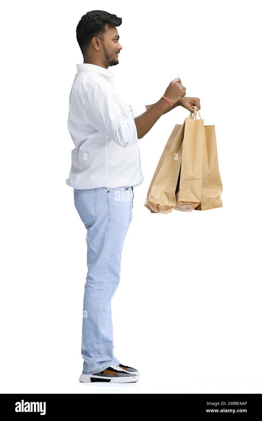 Un homme, sur fond blanc, avec un sac, ondulant, profil Banque D'Images