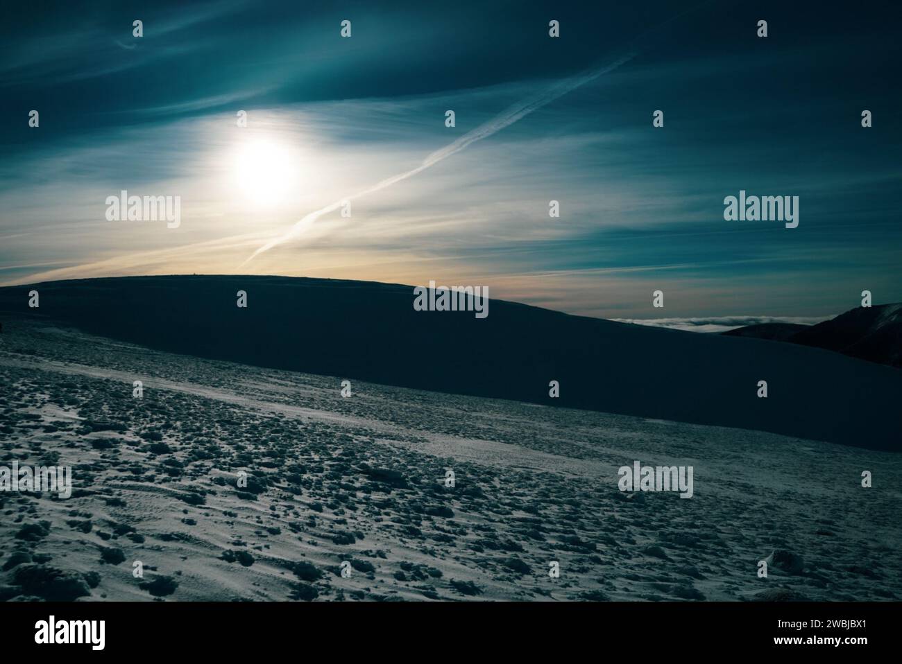 Soleil d'hiver illuminant les vues de Ben Macdui situé dans le parc national de cairngorms en Écosse Banque D'Images