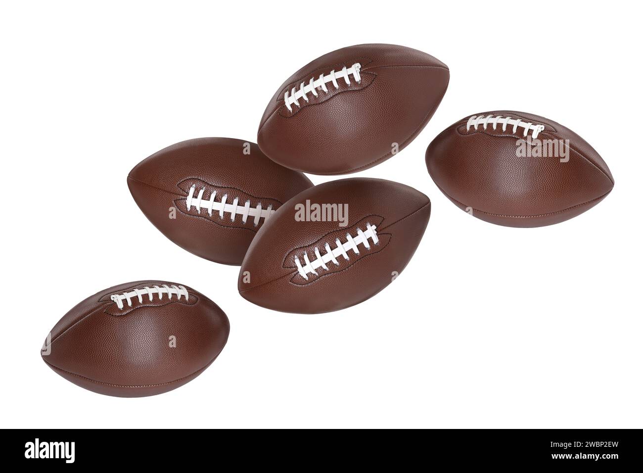 Beaucoup de balles de football américain volant sur fond blanc Banque D'Images