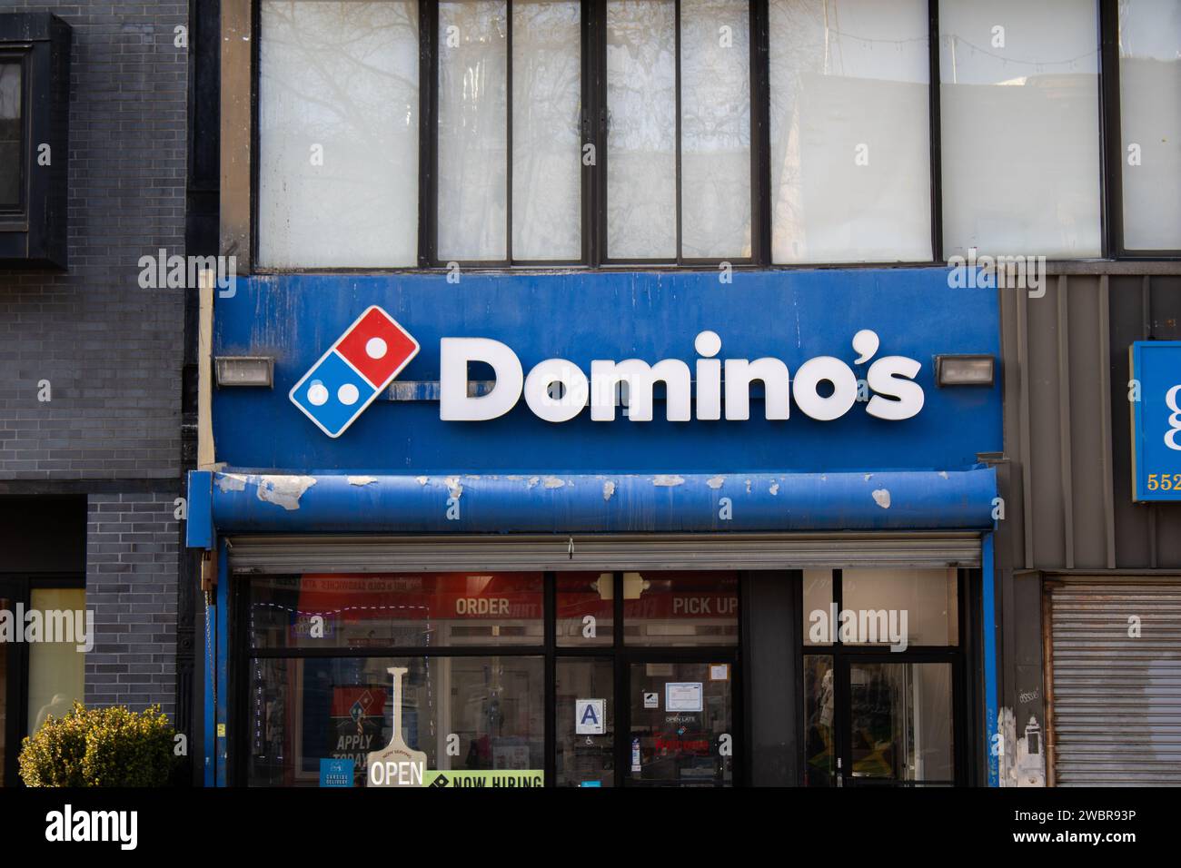 L'entrée du Domino's Pizza à New York Banque D'Images