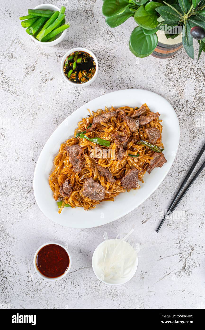 Bœuf avec nouilles de riz cuisine traditionnelle chinoise Banque D'Images
