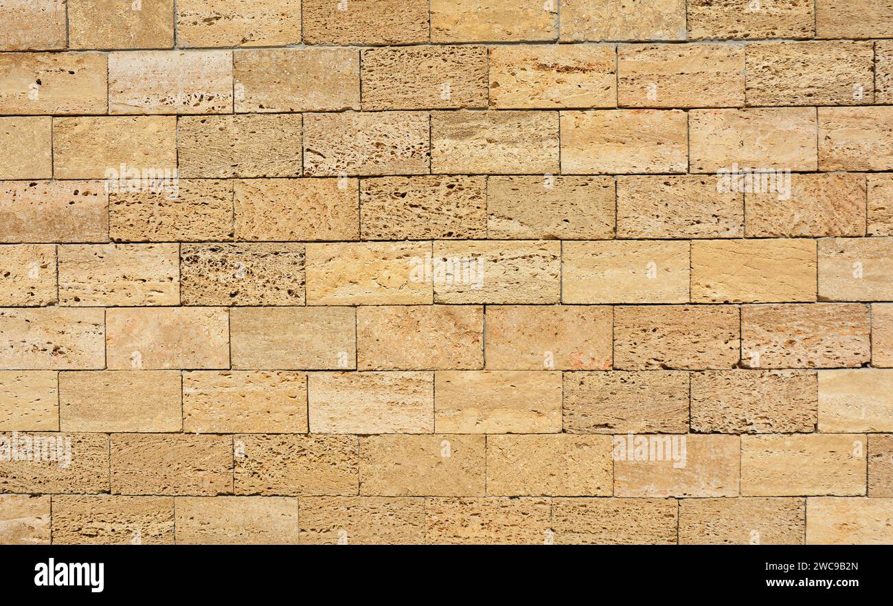 Mur de blocs calcaires Shell. Fond de texture de mur de calcaire de coquille. Banque D'Images