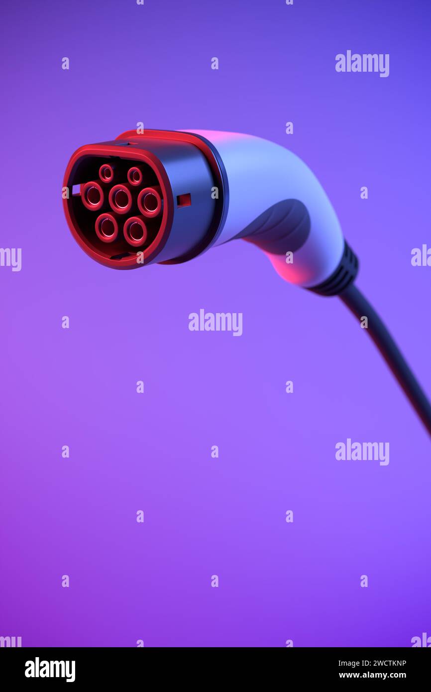 Le connecteur de charge AC officiel européen pour les véhicules électriques appelé IEC 62196 Type 2. Mise au point sélective. Éclairage bicolore en rouge et bleu. Banque D'Images