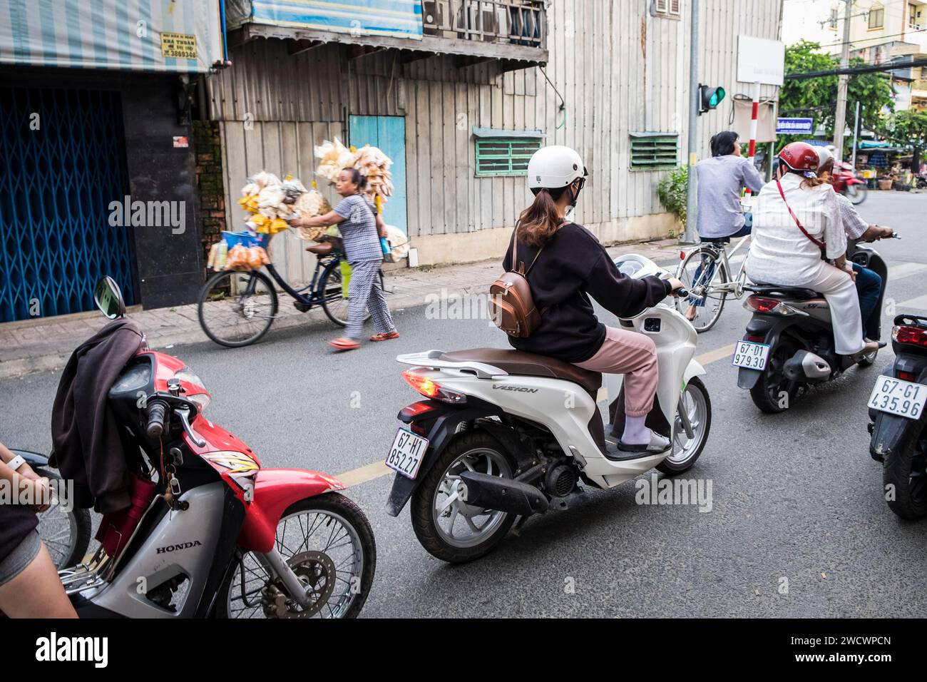 Vietnam, Chau Doc, circulation des motos Banque D'Images