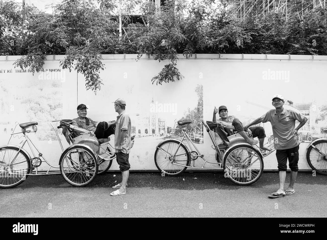 Vietnam, Ho Chi Minh ville, Saigon, chauffeurs de pousse-pousse Banque D'Images
