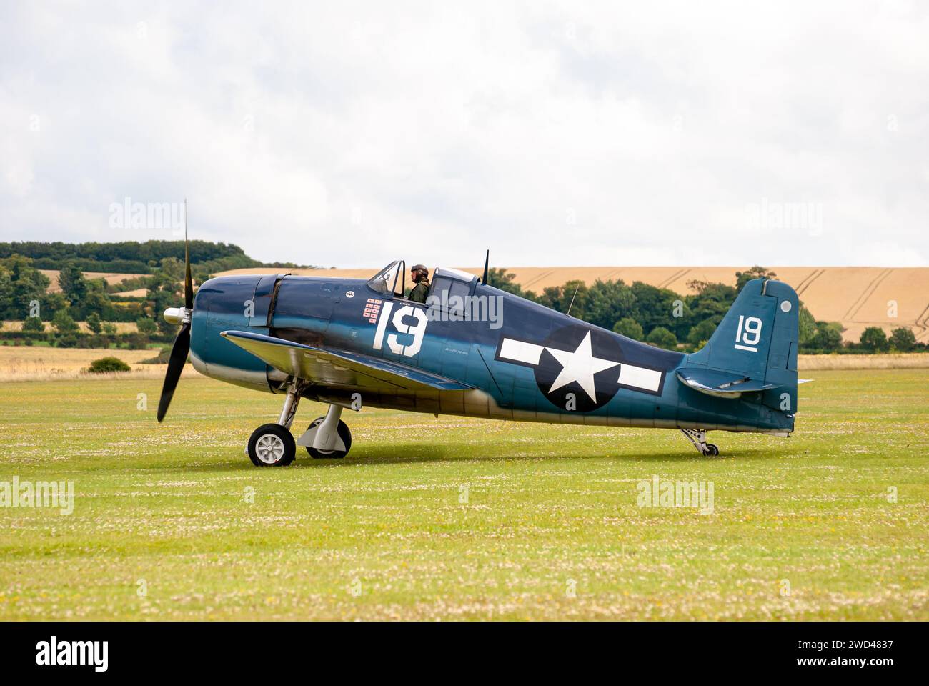 Grumman F6F Hellcat (immatriculation 19) avion de chasse WW2 au salon aérien de Duxford Flying Legends. Banque D'Images