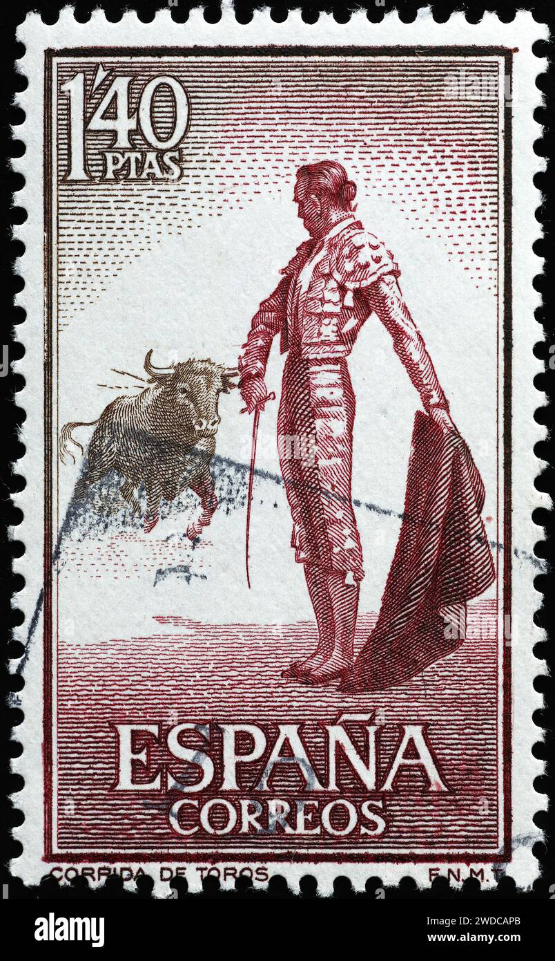 Bull et torero espagnol sur vintage stamp Banque D'Images