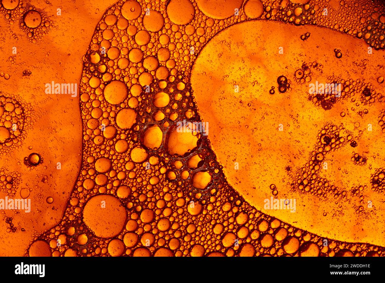 Fond de motif de route circulaire fantastique cosmique orange avec texture lave et unité Banque D'Images
