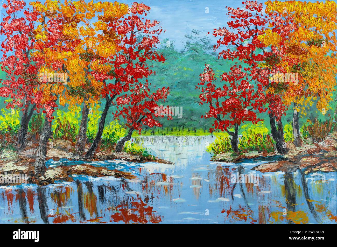 Feuilles d'automne colorées sur les arbres à côté du petit étang dans l'ountryside Banque D'Images