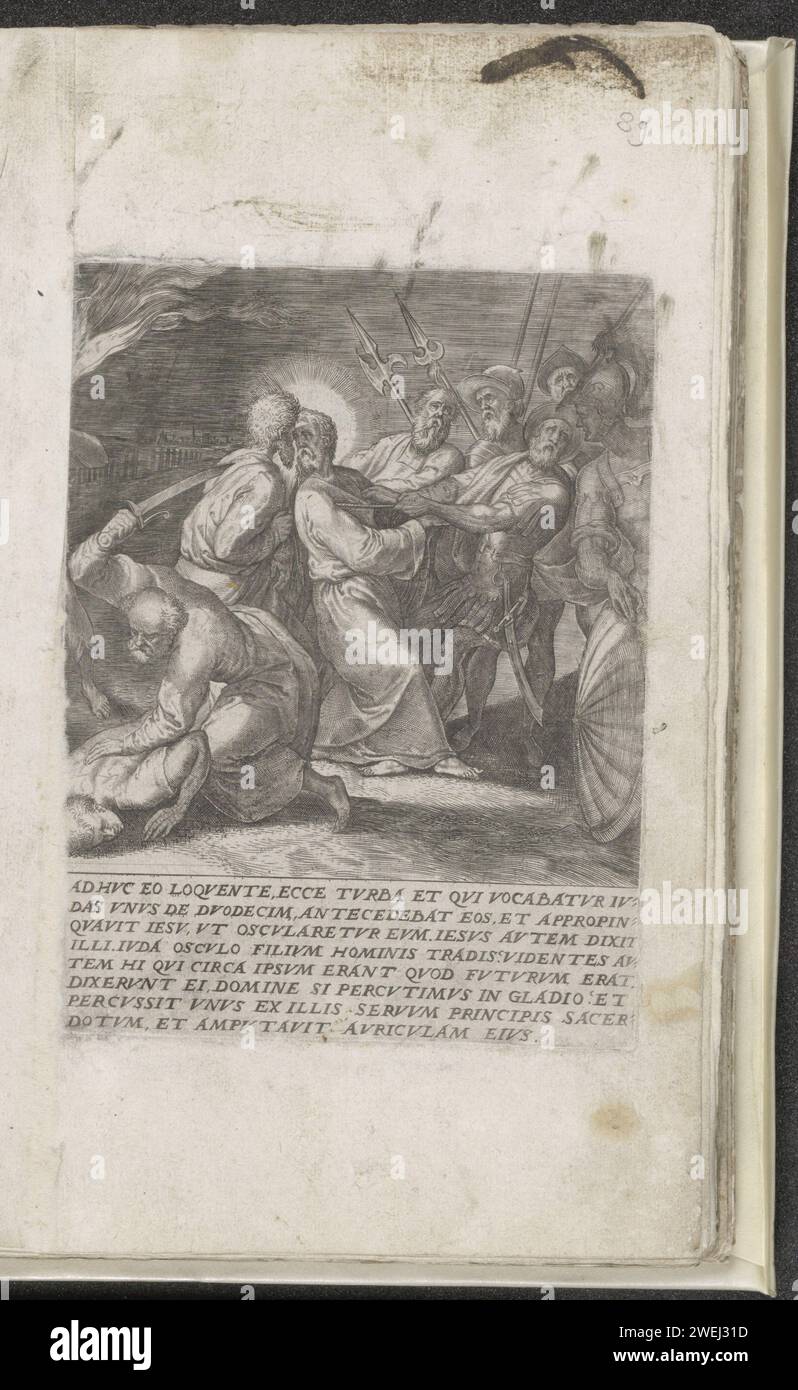 Judaskus et arrestation du Christ, 1572 imprimer Judas embrasse le Christ sur la joue. Les soldats capturent Christ et le tirent avec lui. Pierre est sur le point de couper l'oreille de Malchus. Sous la performance un texte eighable en latin. Ce tirage fait partie d'un album. Papier gravant le baiser de Judas : accompagné de soldats aux torches et aux lanternes, il embrasse le Christ. Pierre tire son épée et coupe l'oreille de Malchus Banque D'Images